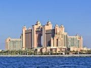 Visit Dubai_Background view from the water of the building the Atlantis Hotel at the top of the Palm in Dubai