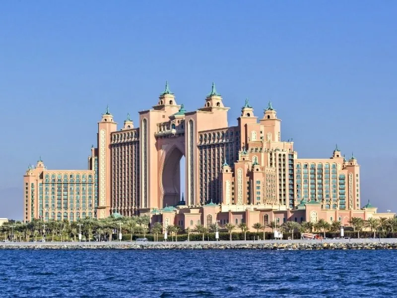 Visit Dubai_Background view from the water of the building the Atlantis Hotel at the top of the Palm in Dubai