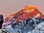 Evening Colored view of Mount Everest from Gokyo Valley with tourist on the way to Everest Base Camp._Great Views of Everest: Pikey Peak Trek.
