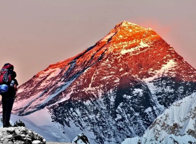 Evening Colored view of Mount Everest from Gokyo Valley with tourist on the way to Everest Base Camp._Great Views of Everest: Pikey Peak Trek.